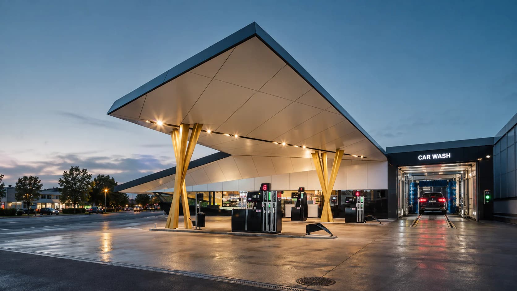 Moderne Tankstelle mit beleuchtetem Vordach und Waschanlage im Abendlicht — atmosphärische Darstellung